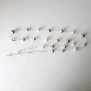 Long faux pearl necklace